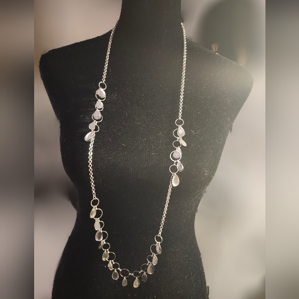 Elegant Silver Necklace with Charms